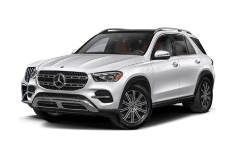 Private transfer vehicle arriving at Mt Buller ski resort with a snowy backdrop.